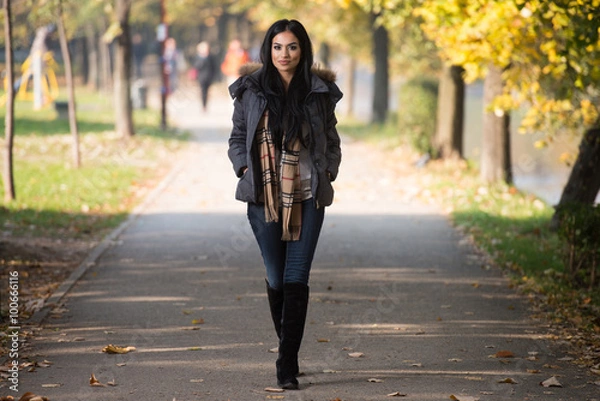 Fototapeta Woman In Autumn Park