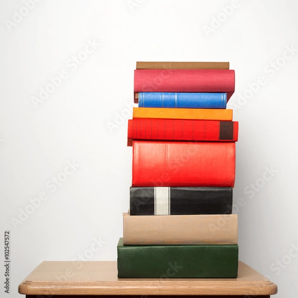 Fototapeta stack of books on the table