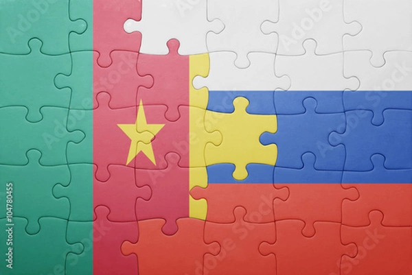 Fototapeta puzzle with the national flag of russia and cameroon