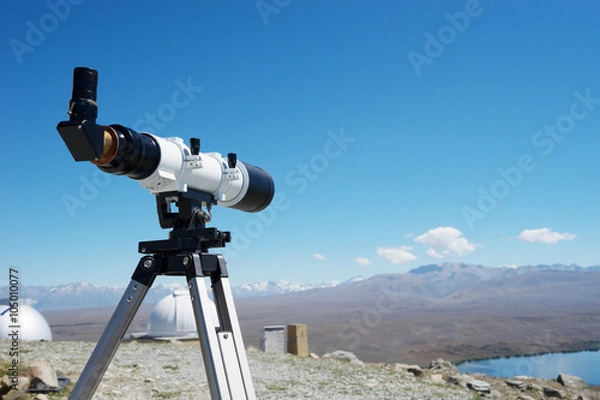 Fototapeta telescope and observatory on ground near lake in summer day in new zealand