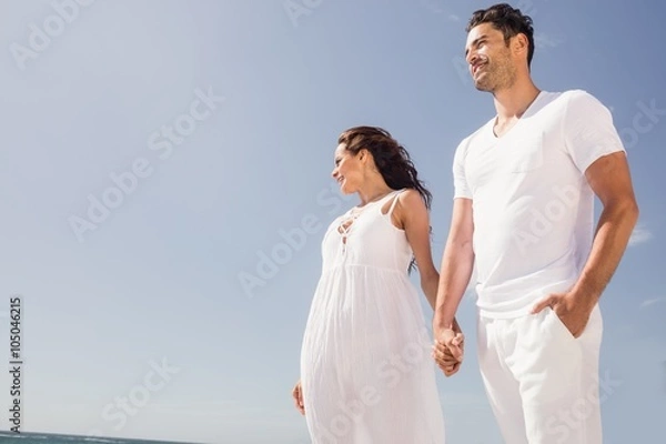 Obraz Smiling couple holding hands