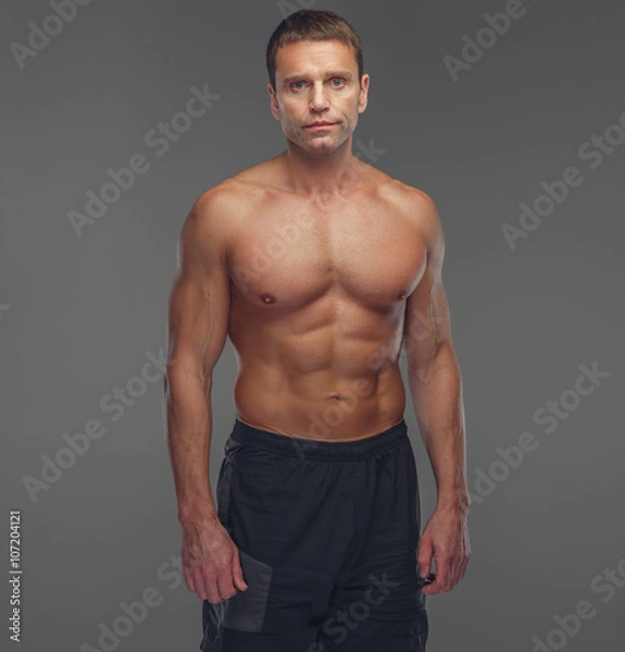 Fototapeta Middle age shirtless muscular man.