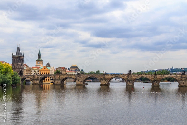 Fototapeta PRAGUE, CZECH REPUBLIC. View of the Vltava river , buildings and The Charles Bridge