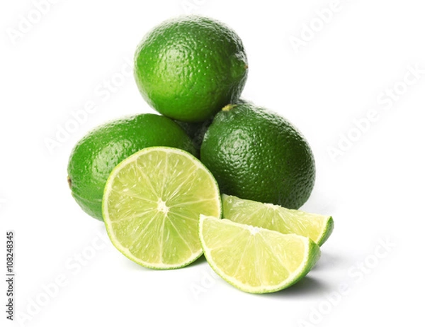 Fototapeta Fresh limes, isolated on white