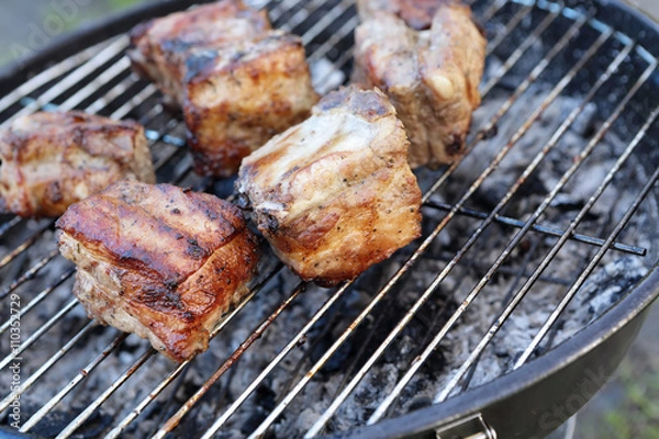 Fototapeta Cooking of pork ribs