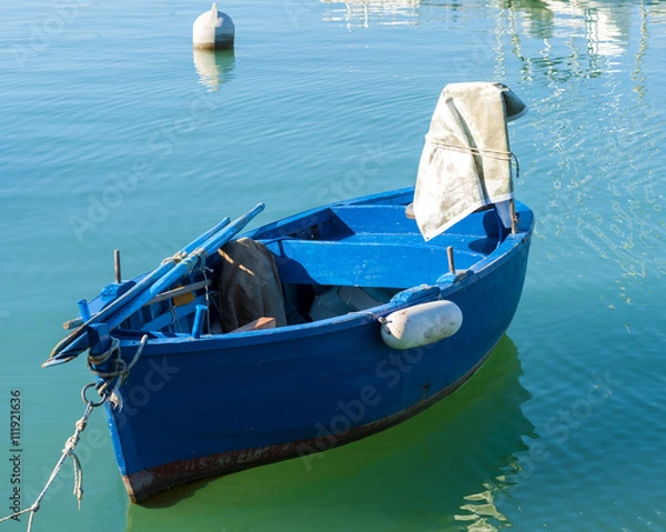 Fototapeta Typical fishing rowboats called gozzo in little port of Giovinazzo, Apulia - Italia