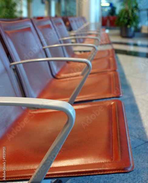 Fototapeta airport empty chairs in waitting room