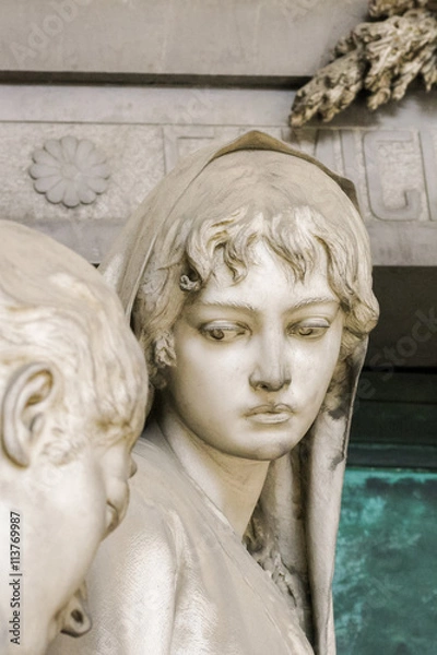 Obraz Head of statue of a grieving girl on monumental cemetery of Staglieno in Genoa.