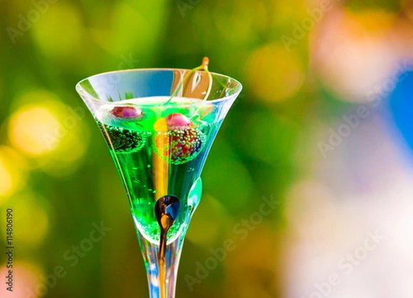 Fototapeta Drink. Absinthe, green background