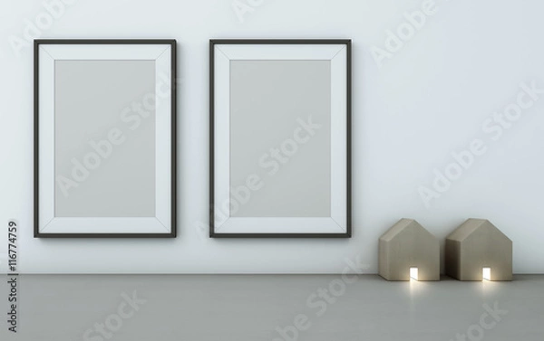 Fototapeta Blank black picture frame on white wall with wood house-shaped lamp - 3D rendering