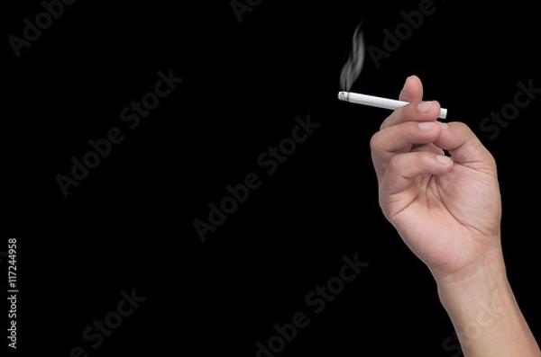 Fototapeta hand holding a cigarette