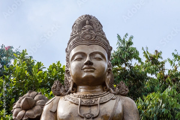 Fototapeta A large statue of Maitreya, the future Buddha, at Kelaniya temple, Sri Lanka