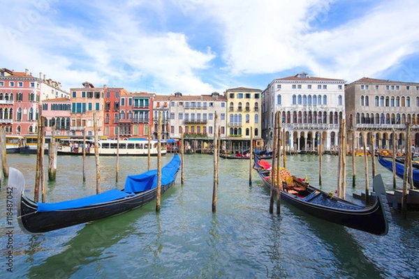 Fototapeta Venice, Italy, June, 21, 2016: gondola sails down the channel in Venice, Italy. Gondola is a traditional transport in Venice, Italy