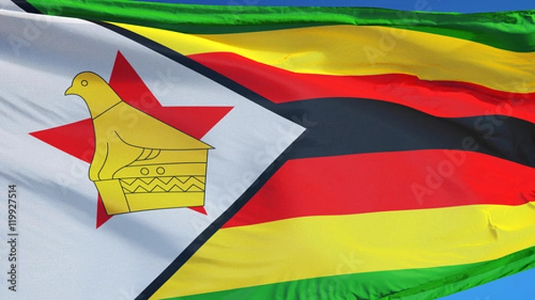 Fototapeta Zimbabwe flag waving against clean blue sky, close up, isolated with clipping path mask alpha channel transparency