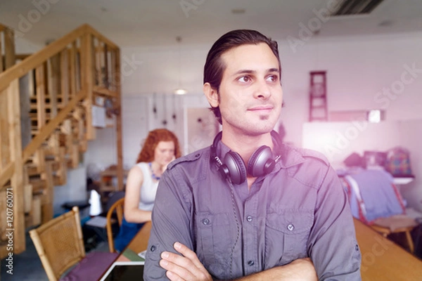 Fototapeta Portrait of young man in office