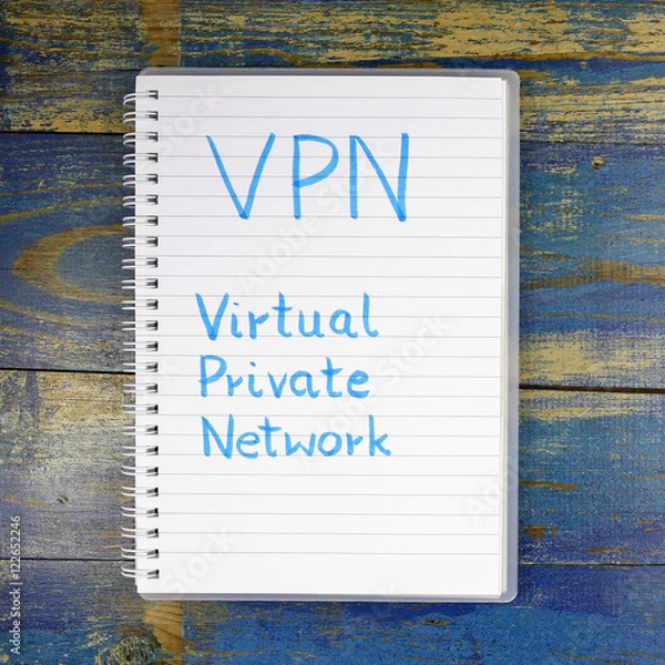 Fototapeta VPN- Virtual Private Network written in notebook on wooden background