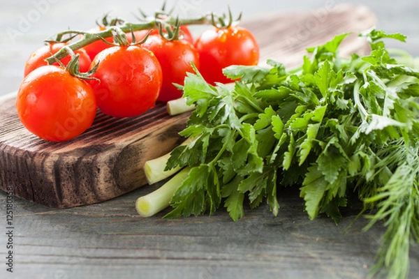 Fototapeta fresh vegetables on a wooden background, selective focus