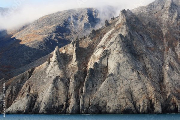 Obraz Mountains to the sea on the shore of Bering Strait near Cape Dezhnev