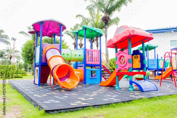 Fototapeta The Colorful playground on yard in the park.