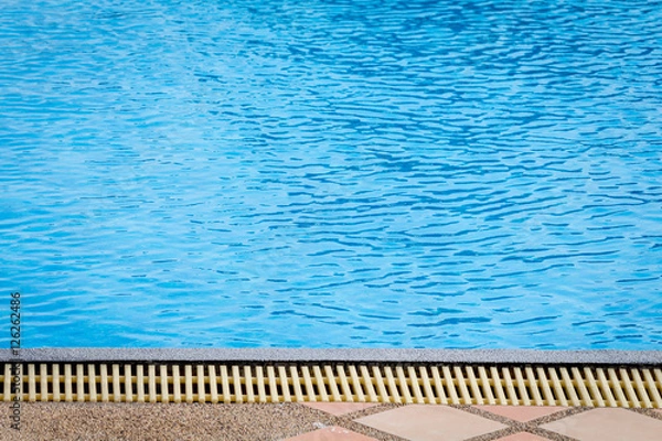 Fototapeta Swimming pool with blue water detail