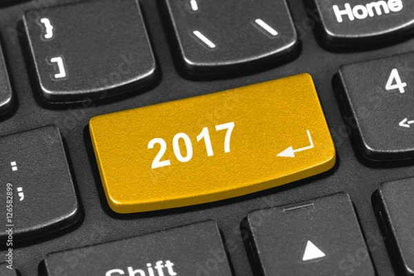 Fototapeta Computer notebook keyboard with 2017 key