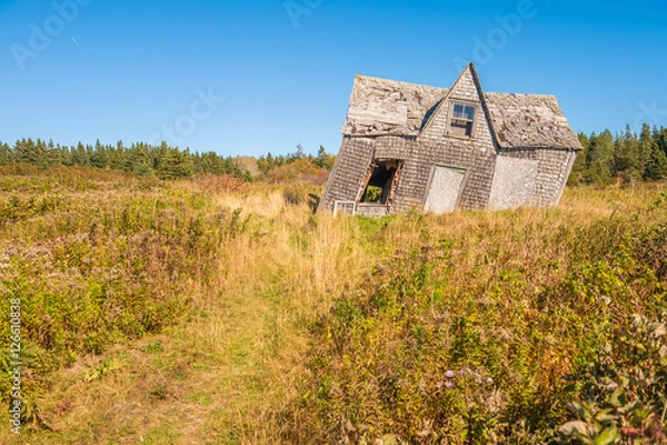 Fototapeta crooked leaning old house