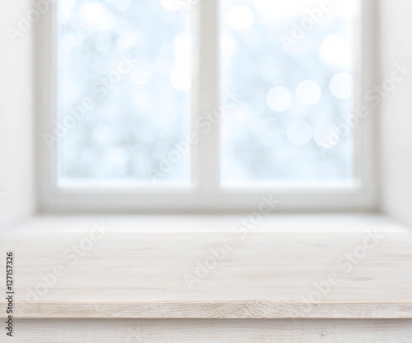 Fototapeta Wooden texture table surface over abstract frosty winter window background