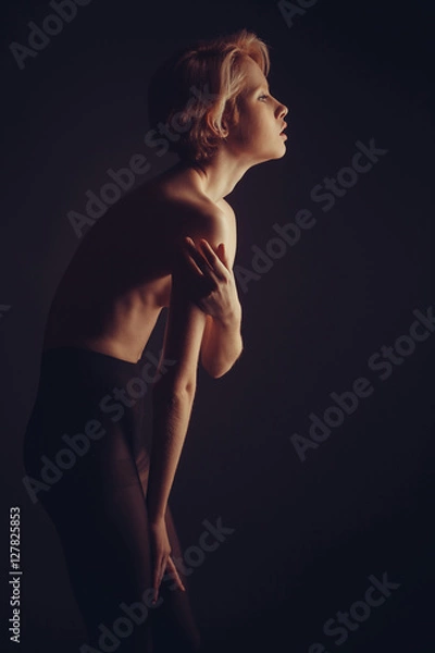 Fototapeta Elegant nude woman with short blond hair.