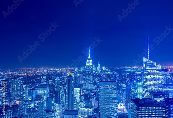 Fototapeta Night view of New York Manhattan during sunset