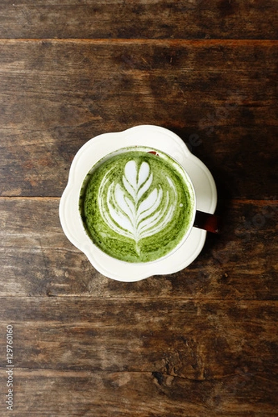 Fototapeta A cup of green tea matcha latte