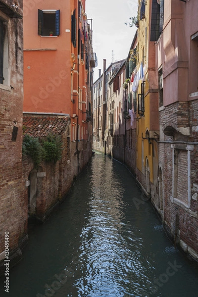 Fototapeta Venetian residential area along small canal