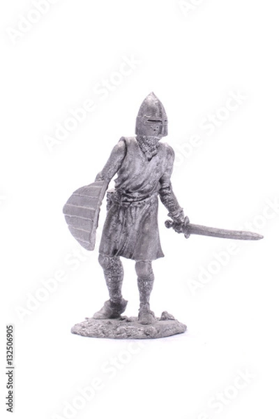 Fototapeta tin soldier medieval knight with sword and shield isolated on wh