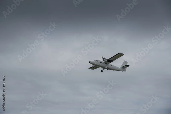 Fototapeta Departing aeroplane from the St Mary's Airport on the Isles of Scilly.