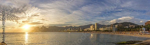 Fototapeta Panoramic landscape of the beaches of Arpoador, Ipanema and Leblon in Rio de Janeiro during sunset with sky and the hill Two brothers and Gávea stone in the background