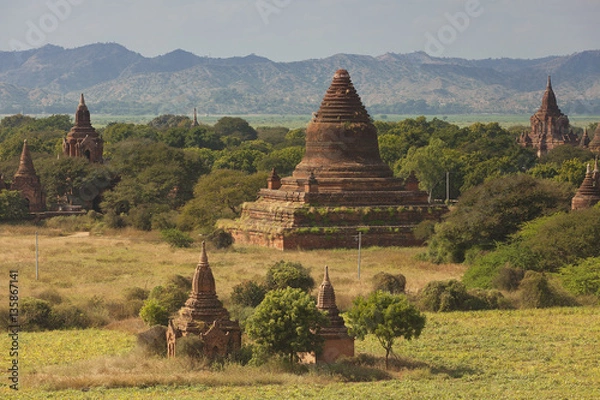 Fototapeta Ancient and isolated brick pagodas in Myanmar