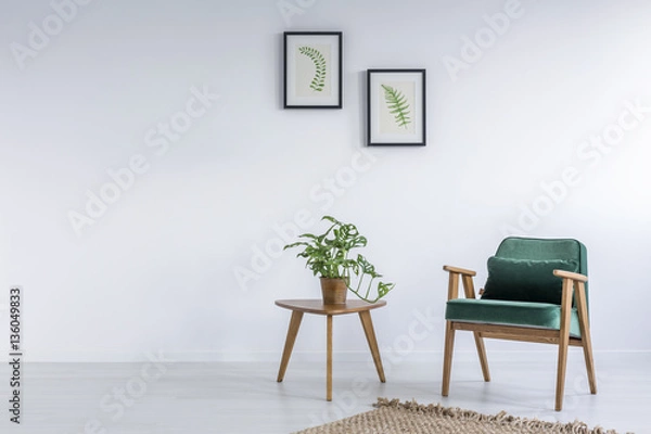 Fototapeta White interior with kale green chair