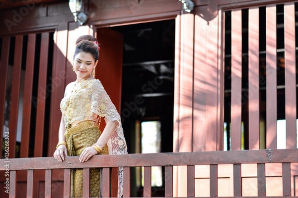 Fototapeta Beautiful Thai girl in Thai traditional costume