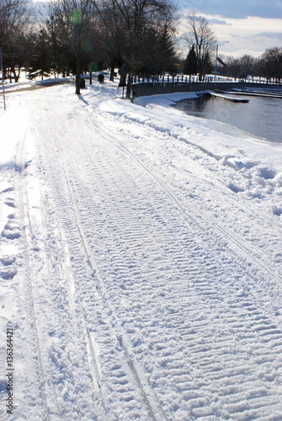 Fototapeta Fresh Snowmobile Tracks