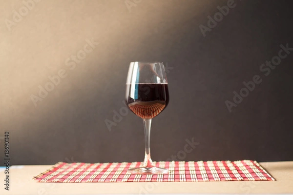 Obraz Pouring red wine into the glass.