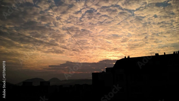 Fototapeta Sunset and sunrise with dramatic colorful clouds. Slovakia