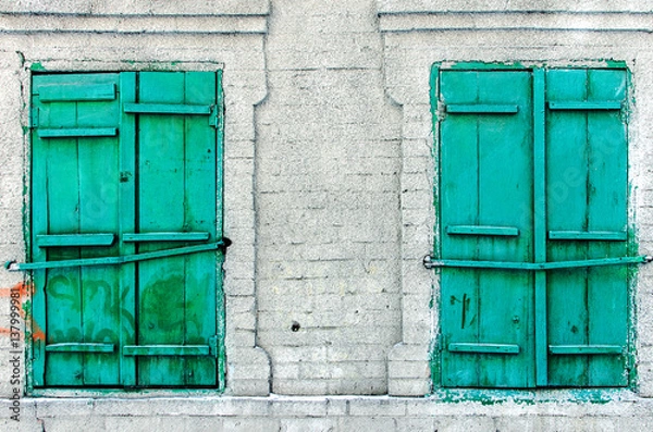 Fototapeta retro window with wooden shutters and stone walls