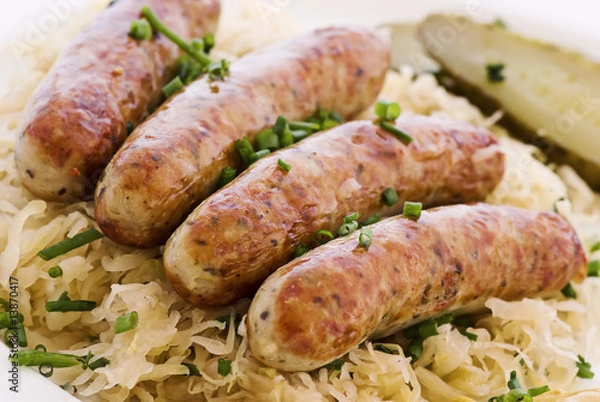 Fototapeta Bratwurst mit Sauerkraut