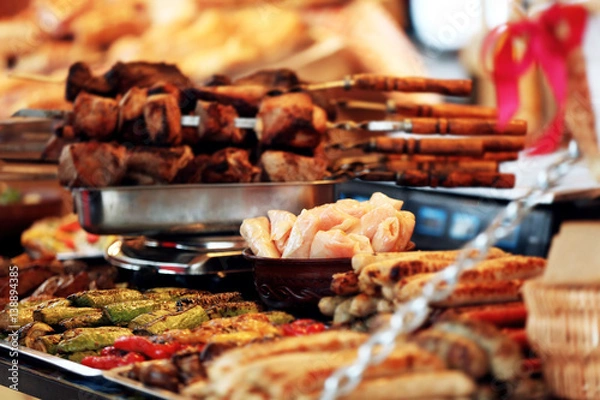 Obraz Trays with different kinds of food on counter