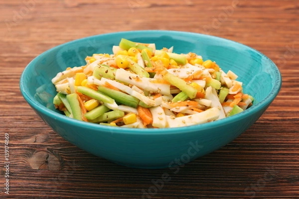 Fototapeta Calamari salad with carrot and cucumber