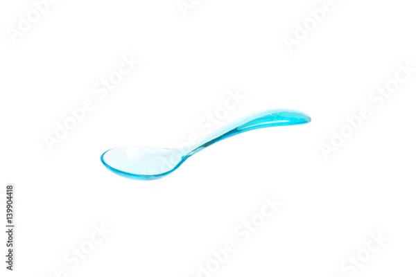 Fototapeta Light Blue Plastic Spoon