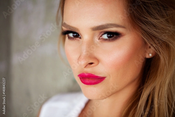 Fototapeta magnificent portrait of a beautiful young woman with perfect skin closeup