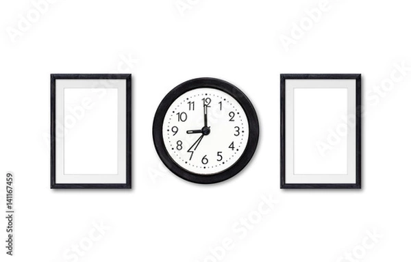 Fototapeta Alarm clock and two wooden photo frames mock ups on the wall, interior decor wallpaper