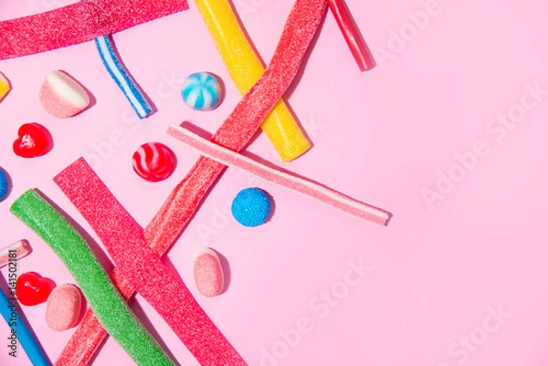 Fototapeta Top view of mixed colorful candies and lollies