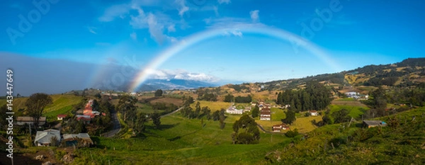 Fototapeta Green meadows and rainbow. View from slope of volcano of Irazu to the valley. Costa Rica