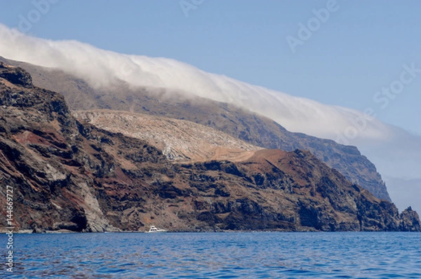 Fototapeta Fog rolls in over Guadelupe Island Baja Mexico